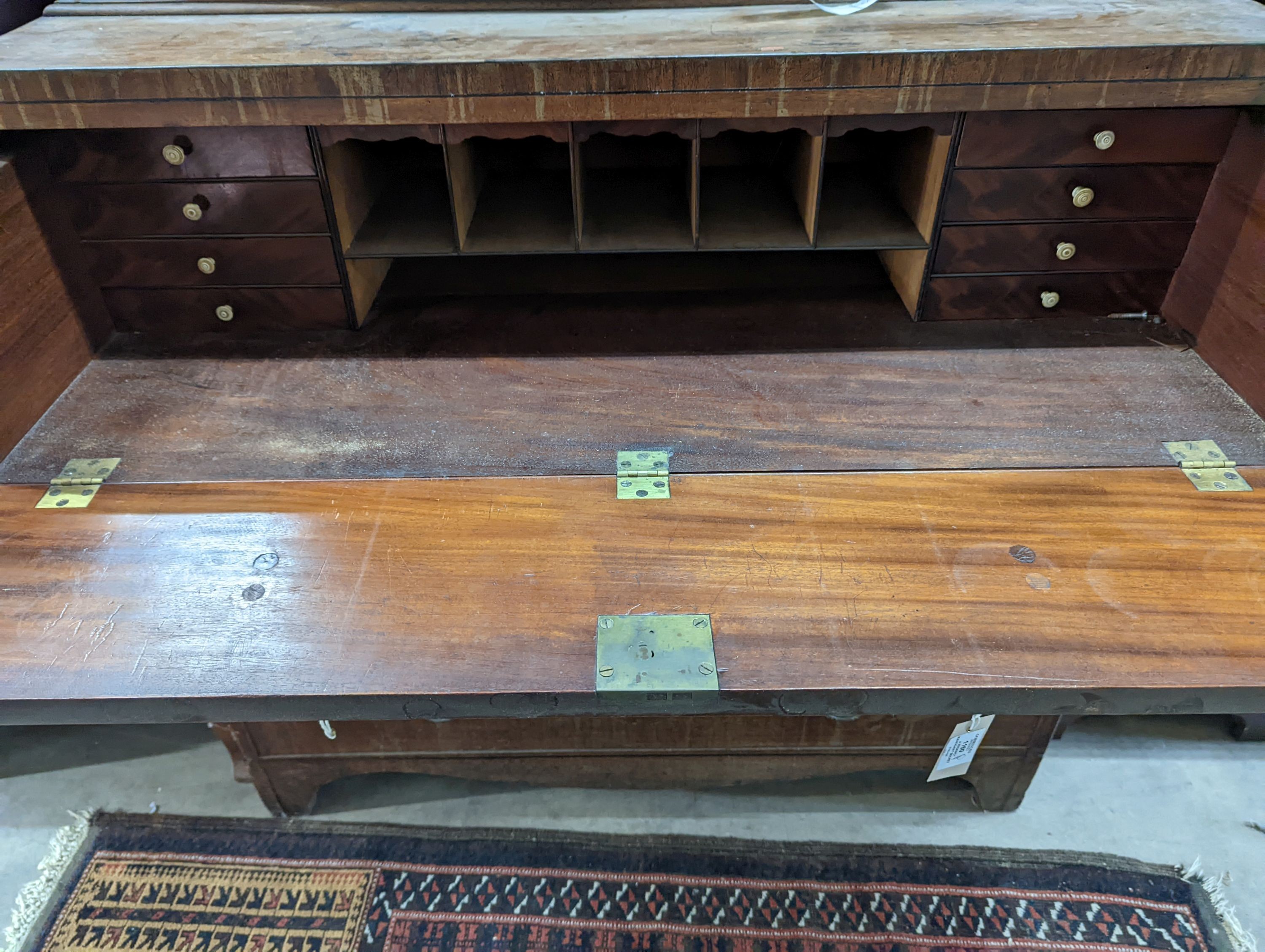 A Regency mahogany secretaire bookcase, length 106cm, depth 52cm, height 232cm